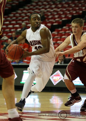 Arizona G Wise makes an aggressive move at the top of the key