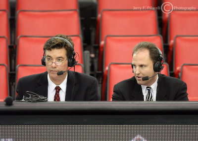 Arizona radio announcers Brian Jefferies and Ryan Hansen call the game in a near empty arena