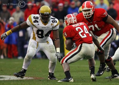 Georgia Tech DT Elris Anyaibe squares up to meet Georgia TB Moreno