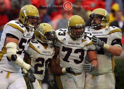 Yellow Jackets OL Smith, Lentz and Voss celebrate a RB Jones TD in the fourth quarter