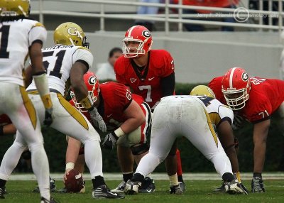 UGA QB Stafford looks over the defense and calls out signals before the snap