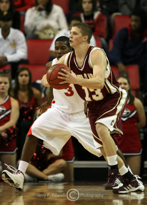 Santa Clara G Alexander makes a pass from the corner as he is guarded by Georgia G Ware