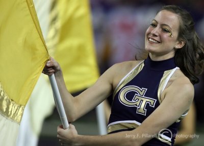 Georgia Tech flag girl performs at halftime