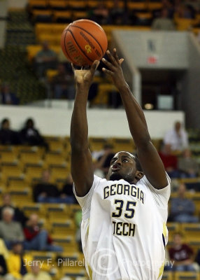 Jackets F Zachery Peacock concentrates on a jumper from the top of the key