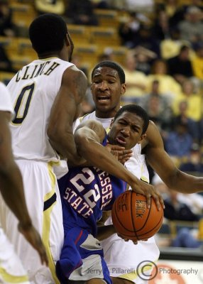 Yellow Jackets G Nick Foreman ties up TSU G Gerald Robinson with help from Lewis Clinch