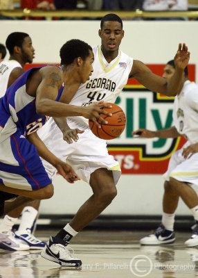 Jackets F Aminu works to stay in front of TSU F Cox