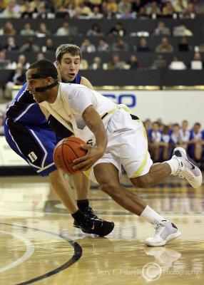 Georgia Tech G Maurice Miller drives past Duke defender Greg Paulus