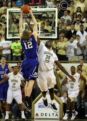 Georgia Tech F Peacock gets high in the backcourt to attempt to steal a baseline inbounds pass from Duke F Singler