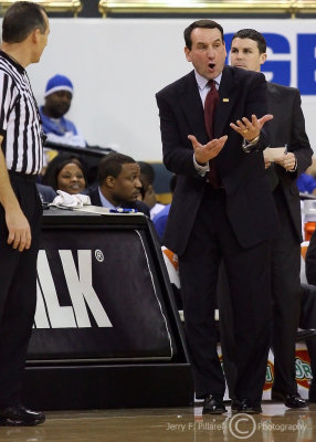 Duke Blue Devils Head Coach Mike Krzyzewski comes off of the bench to argue a call with a referee