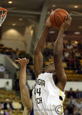 Georgia Tech F Aminu moves to the basket for a score