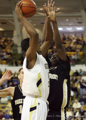 Jackets F Aminu elevates and shoots over Demon Deacons F Aminu