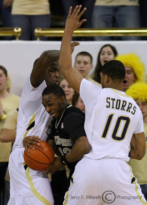 Jackets defenders trap Deacons G Williams along the baseline