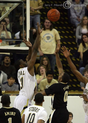 Georgia Tech F Lawal gets high to block a shot by Wake Forest G Jeff Teague