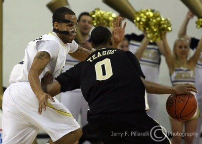 Yellow Jackets G Miller attempts to get in front of the hard charging Demon Deacons G Teague
