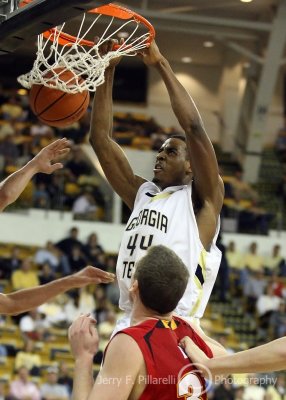 Georgia Tech F Alade Aminu slams home a powerful dunk