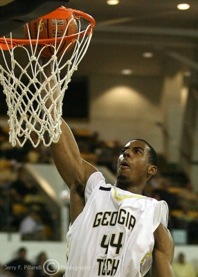 Yellow Jackets F Aminu goes in for a breakaway dunk