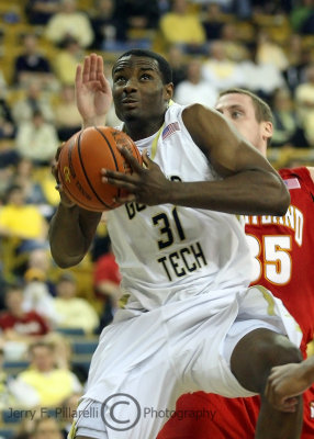 Yellow Jackets F Lawal pulls down an offensive rebound
