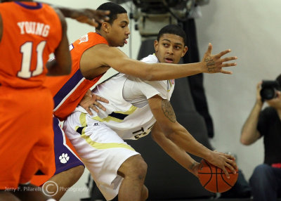 Georgia Tech G Lance Storrs looks for a teammate while being trapped in the corner