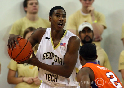 Georgia Tech G Shumpert looks for a teammate while being defended on the baseline by Clemson G Stitt