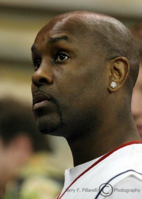 Former NBA star Gary Payton watches the Yellow Jackets beat the Hurricanes