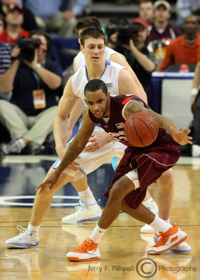 Hokies G Delaney works to regain possession after it was poked away by Tar Heels F Hansbrough