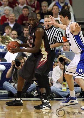 Florida State C Alabi looks to make a move against Duke C Zoubek