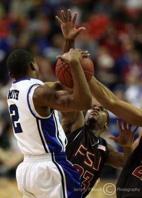 Florida State G Douglas attempts to stop Duke G Smith on the baseline