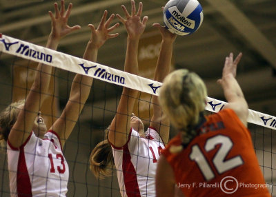 Lady Governors S Marie Mullins and MB Jessica Mollman block a spike by Bears OH Urbelis