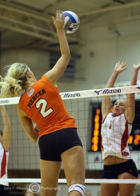 Bears MB Libby Hansch spikes into the block of Lady Governors OH Stephanie Champine