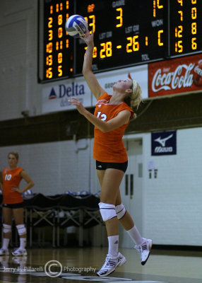 Mercer OH Urbelis makes contact on her serve