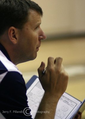 Jackets Assistant Coach Craig Bere watches the action