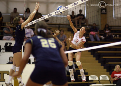 GT OH Alison Campbell defends against an Austin Peay OPP Kristen Distler spike