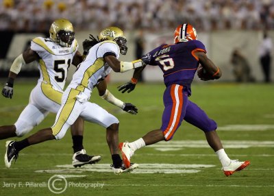 Georgia Tech CB Butler grabs a hold of Clemson WR Ford after the catch