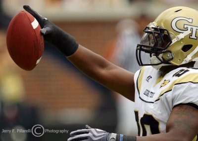 Jackets A-back Jones salutes the fans in the end zone after his first quarter score