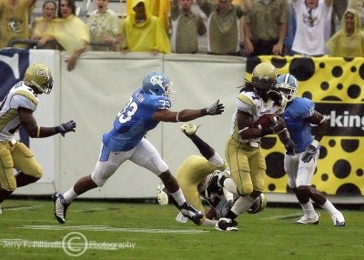 Yellow Jackets S Burnett sprints down field with his second interception of the game