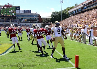 Tech QB Nesbitt scores a first quarter touchdown