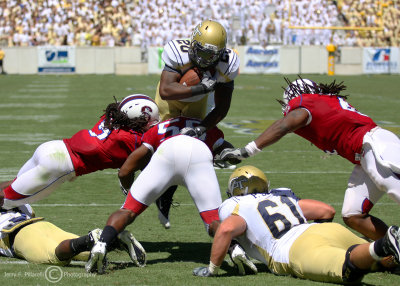 Georgia Tech A-back Roddy Jones goes airborne at the goal line