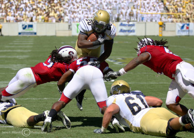 Georgia Tech A-back Roddy Jones goes airborne at the goal line…