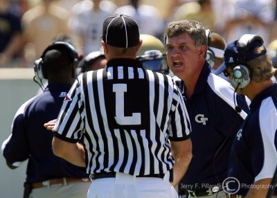 Georgia Tech Yellow Jackets Head Coach Paul Johnson has a discussion with the line judge