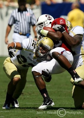Yellow Jackets S Cooper Taylor upends Bulldogs RB Jordan