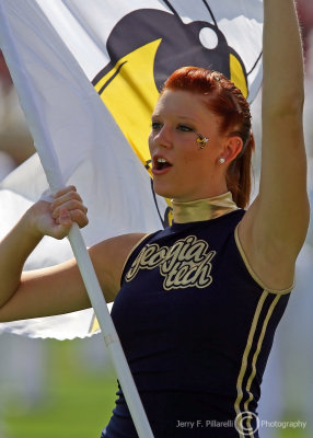 Yellow Jackets flag girl performs during pregame ceremonies