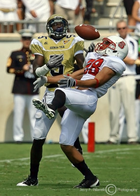 …Jackets WR Hill has the ball fall incomplete as the pass is broken up by NC State CB Byers