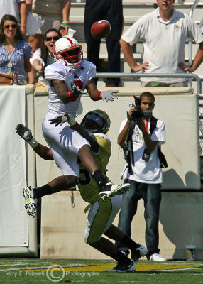 Jackets CB Reese attempting to defend a TD pass to Wolfpack WR Graham