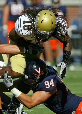 Georgia Tech B-back Allen attempts to run over Virginia DT Matt Conrath