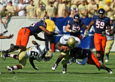 Yellow Jackets QB Nesbitt works off a block by A-back Peeples to gain extra yardage