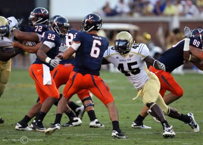 Jackets LB Jeremiah Attaochu wraps up Cavaliers QB Verica for a second half sack