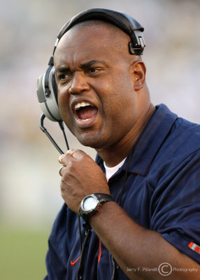 Virginia Cavaliers Head Coach Mike London yells instructions to his defensive unit