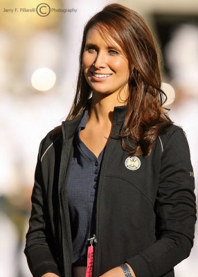 Professional Golfers Association representative takes in the halftime festivities