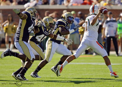 Jackets defenders force Miami QB Morris to throw on the run