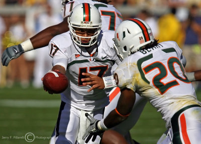 Hurricanes QB Morris hands off to RB Berry